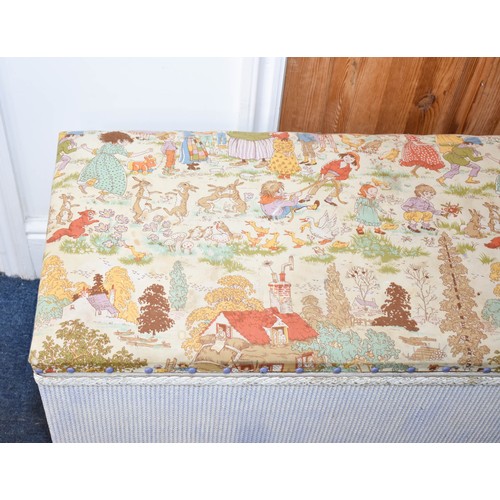 312 - A Lloyd Loom Style Ottoman With Cute Vintage Fabric Top. 93cm x 42cm x 45cm.