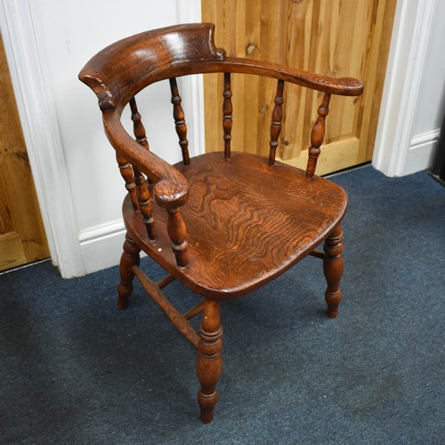 329 - An Aged Antique Wooden Captain's Chair