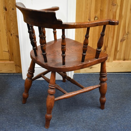 329 - An Aged Antique Wooden Captain's Chair