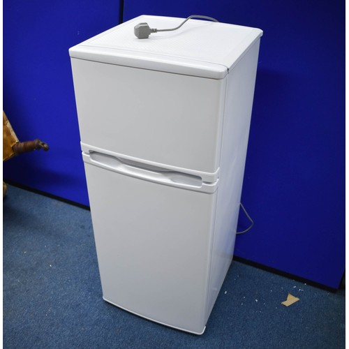 337 - A Fridge Freezer. 48cm wide x 49cm deep x 115 high. (Untested and sold as seen, however, this is fro... 