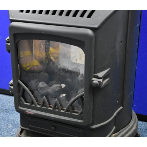 339 - A Freestanding Gas Heater Designed In An Antique Coal Store Look. On Wheels. 80cm High x 55cm Deep x... 