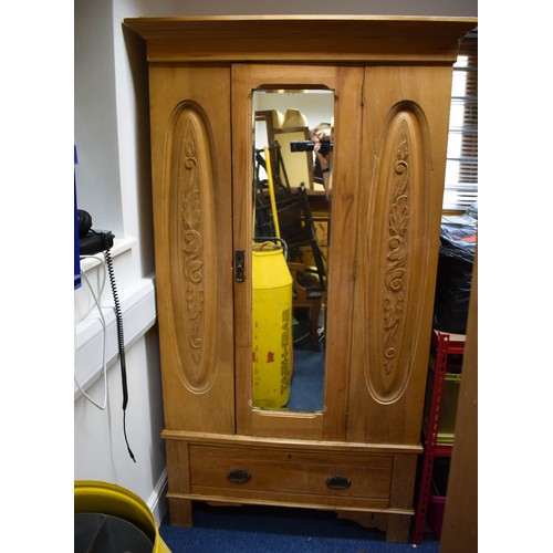 340 - A Pine Breakdown Pine Wardrobe Featuring Carved Detailing, A Mirror And A Drawer.