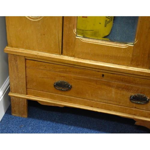 340 - A Pine Breakdown Pine Wardrobe Featuring Carved Detailing, A Mirror And A Drawer.