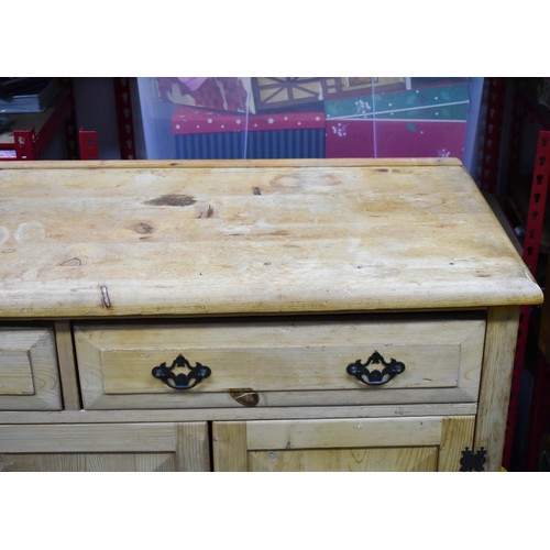 350 - An Aged Pine Sideboard. (A/F). 128cm x 50cm x 90cm.