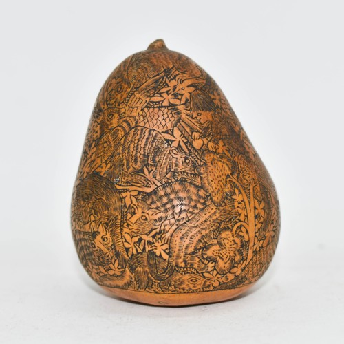 385 - An Antique Highly Carved Gourd