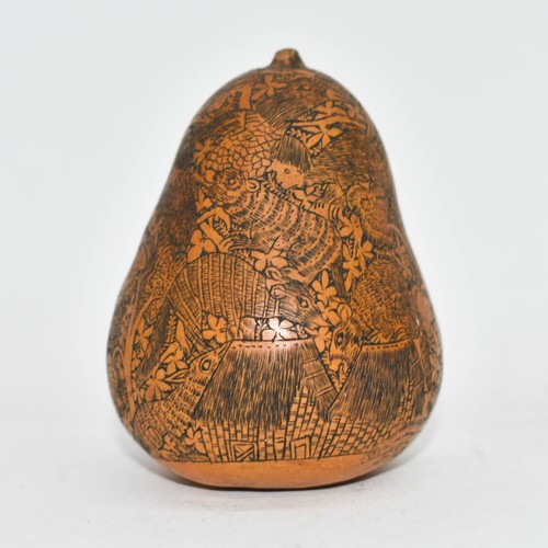 385 - An Antique Highly Carved Gourd