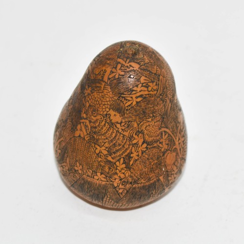 385 - An Antique Highly Carved Gourd