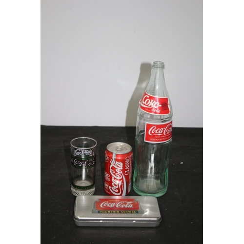 229 - A Selection of Coca Cola Merchandise