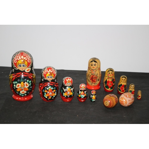 232 - 2 Matryoshka 5 piece each ( Russian Dolls) and 2 painted Easter Eggs