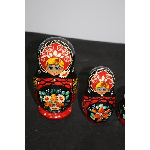 232 - 2 Matryoshka 5 piece each ( Russian Dolls) and 2 painted Easter Eggs