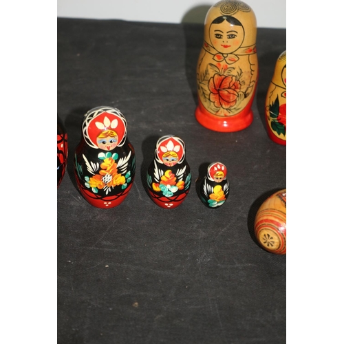 232 - 2 Matryoshka 5 piece each ( Russian Dolls) and 2 painted Easter Eggs