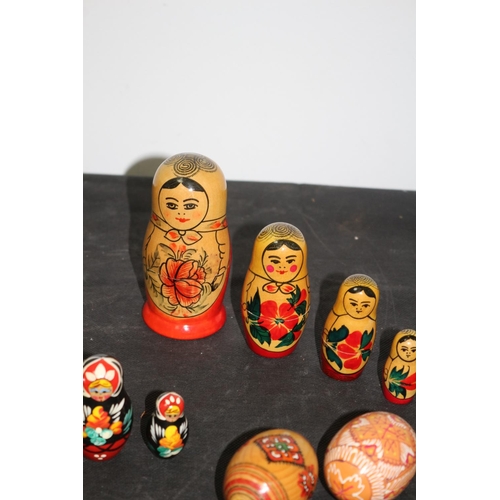 232 - 2 Matryoshka 5 piece each ( Russian Dolls) and 2 painted Easter Eggs