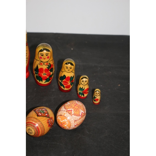 232 - 2 Matryoshka 5 piece each ( Russian Dolls) and 2 painted Easter Eggs