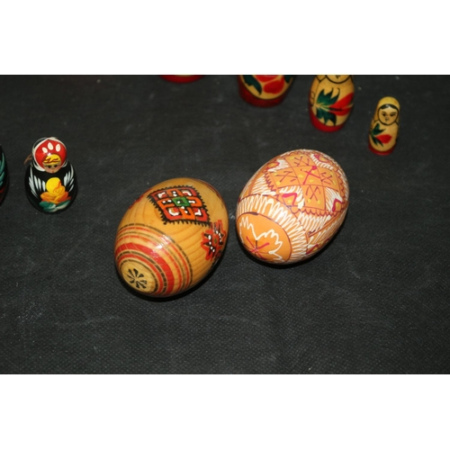 232 - 2 Matryoshka 5 piece each ( Russian Dolls) and 2 painted Easter Eggs