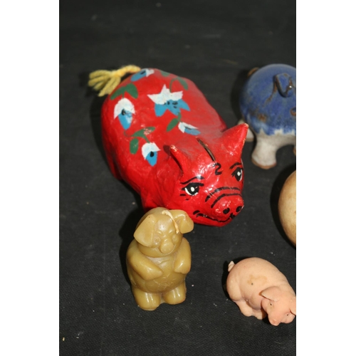 233 - A Collection of Pig Ornaments, Stone Pottery and more