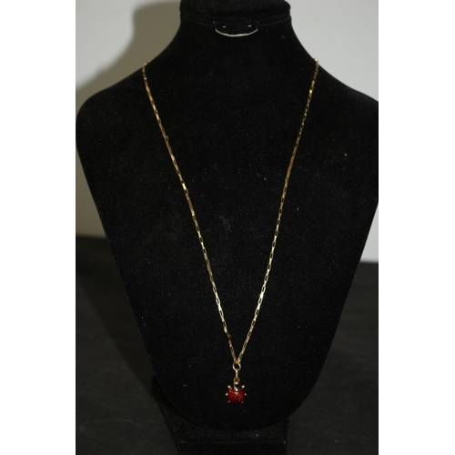 17 - 9ct Gold Chain with a Gold and Enamel Ladybird Pendant. 4 grams