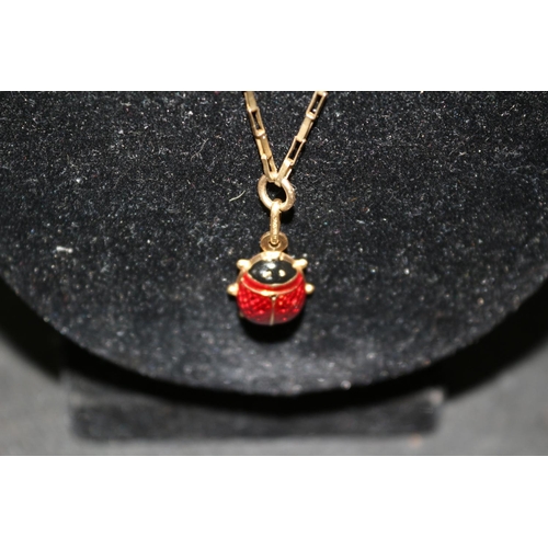 17 - 9ct Gold Chain with a Gold and Enamel Ladybird Pendant. 4 grams