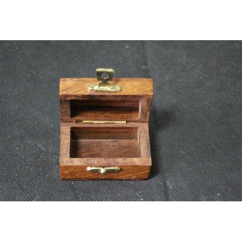 24 - A Collection of Wooden Boxes including Pen Boxes with Oriental Theme