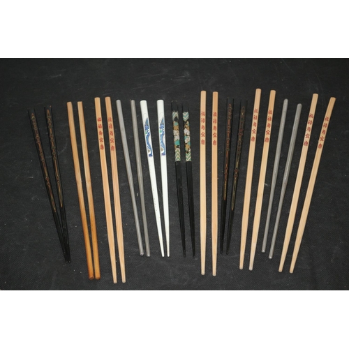 226 - A Collection of Chopsticks Wooden and Metal