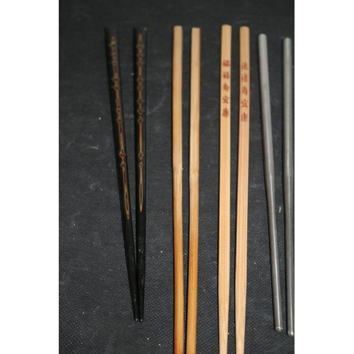 226 - A Collection of Chopsticks Wooden and Metal