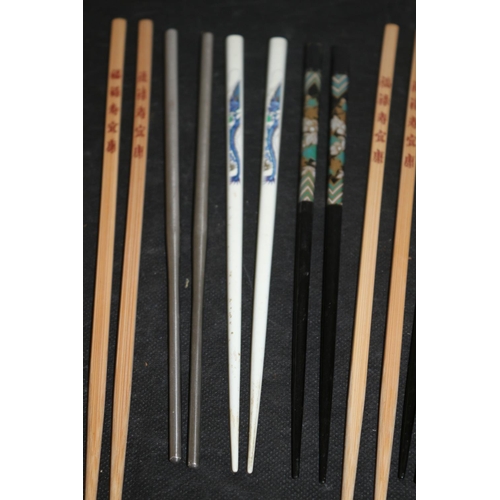 226 - A Collection of Chopsticks Wooden and Metal