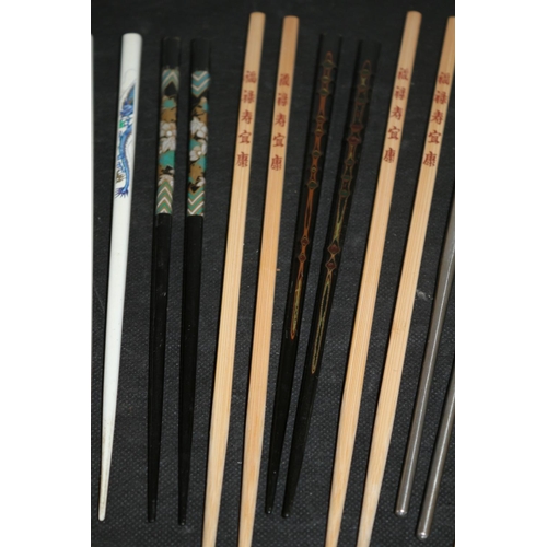 226 - A Collection of Chopsticks Wooden and Metal