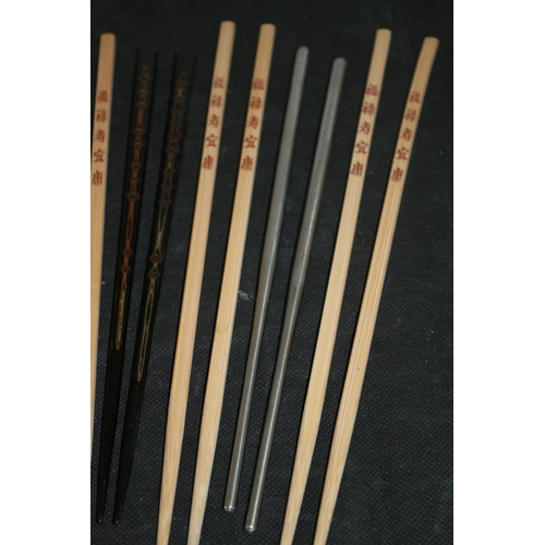 226 - A Collection of Chopsticks Wooden and Metal