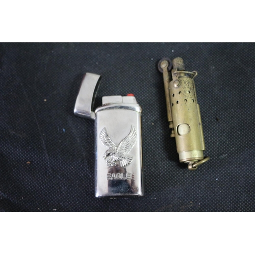 246 - 2 Lighters. One Brass with Age and Eagle Electric