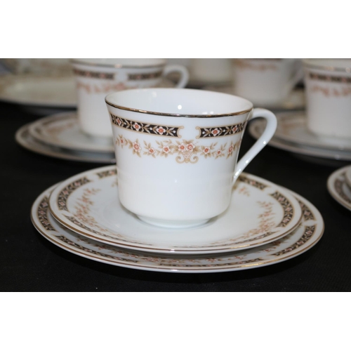 261 - A Set of Dinnerware Marked Fine Porcelain Made in Japan 2858A 30 pieces including Cups, Saucers and ... 