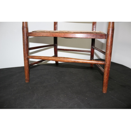 264 - A Ladder Back Wood Chair with Age