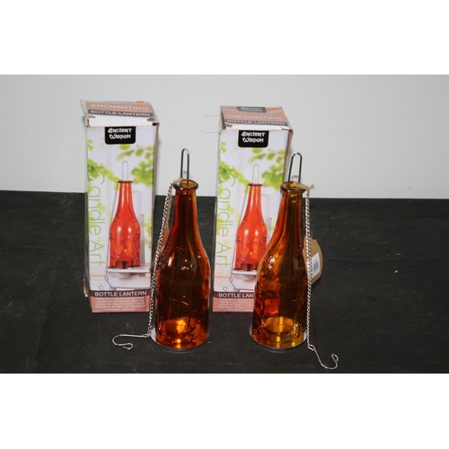 99 - 2 New in Boxes Bottle Lanterns