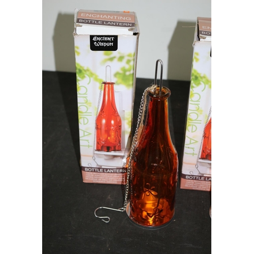 99 - 2 New in Boxes Bottle Lanterns