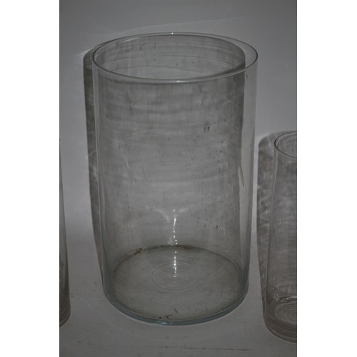 294 - 1 Large Glass Vase with 2 other Same Size Glass Vases