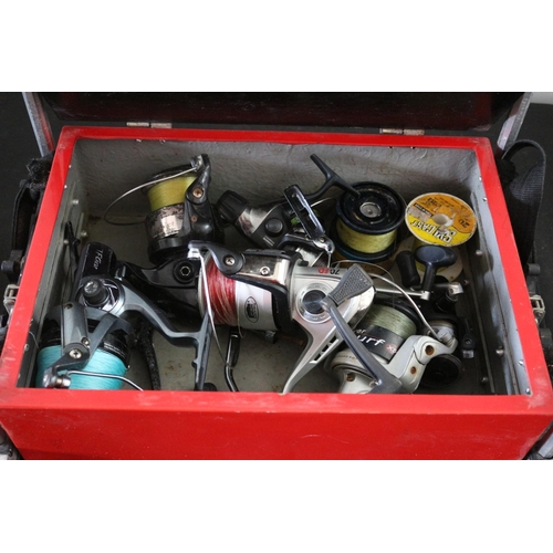 299 - Fishing Box with Adjustable Legs and a Selection of Reels, Lines and other Items