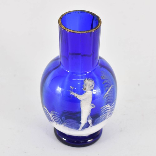 321 - A Mary Gregory Bristol Blue Glass Vase Featuring White Decoration. 11.5cm Height.