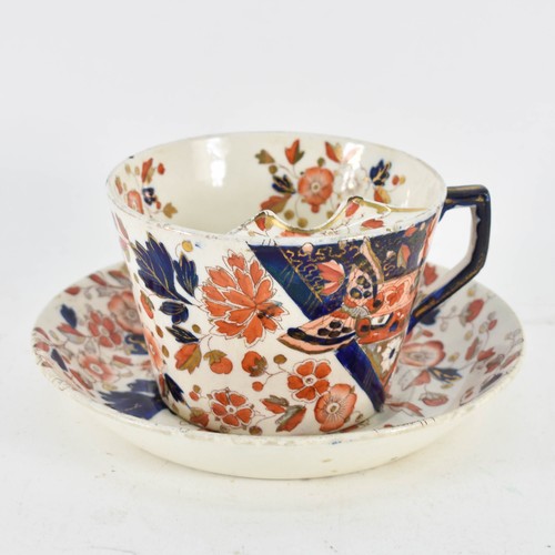 326 - A Royal Crown Derby Cup And Saucer In Floral Imari Style Decoration Featuring A Mustache Guard. Circ... 