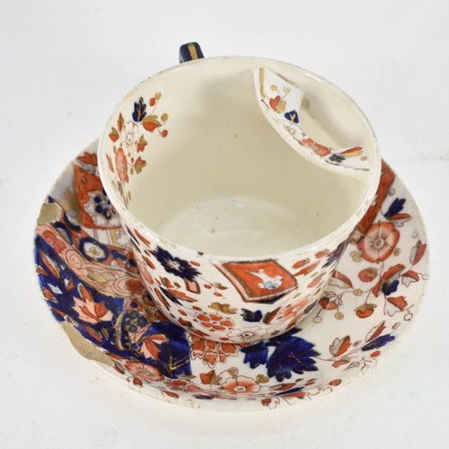 326 - A Royal Crown Derby Cup And Saucer In Floral Imari Style Decoration Featuring A Mustache Guard. Circ... 