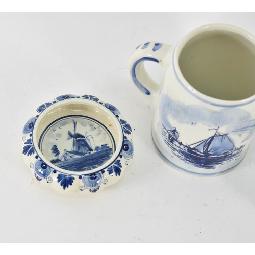 350 - A Collection Of 4 Delfts Blauw Items Depicting Dutch Scenes Including A Cup And Clogs