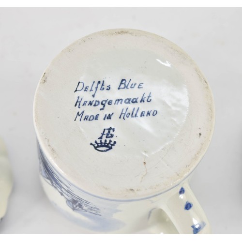 350 - A Collection Of 4 Delfts Blauw Items Depicting Dutch Scenes Including A Cup And Clogs