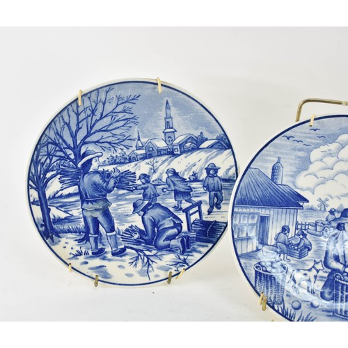 351 - A Collection Of 4 Delfts Blauw Plates Depicting Dutch Country Scenes. 19cm Diameter.