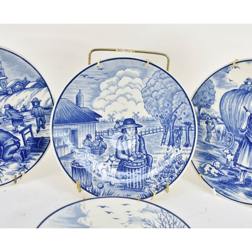 351 - A Collection Of 4 Delfts Blauw Plates Depicting Dutch Country Scenes. 19cm Diameter.