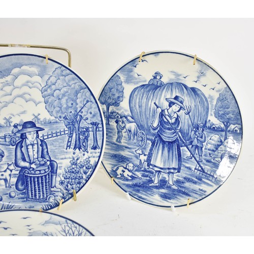 351 - A Collection Of 4 Delfts Blauw Plates Depicting Dutch Country Scenes. 19cm Diameter.