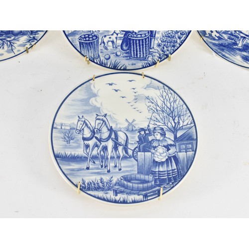 351 - A Collection Of 4 Delfts Blauw Plates Depicting Dutch Country Scenes. 19cm Diameter.