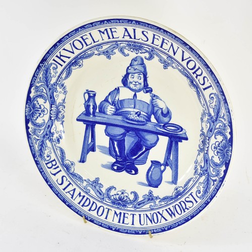 352 - A Large Delfts Blauw Style Wall Plate Featuring A Sausage Advertisement Design. Marked 