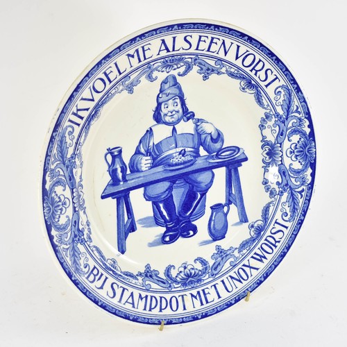 352 - A Large Delfts Blauw Style Wall Plate Featuring A Sausage Advertisement Design. Marked 