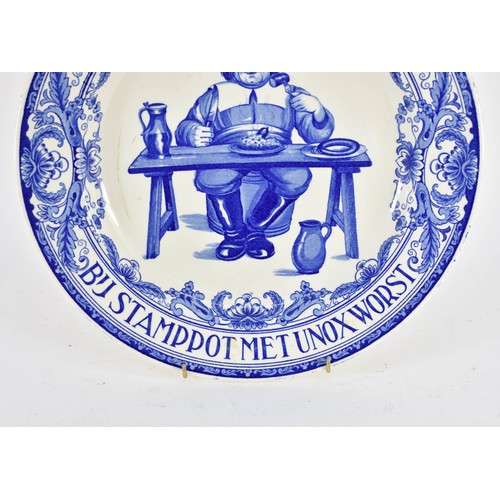 352 - A Large Delfts Blauw Style Wall Plate Featuring A Sausage Advertisement Design. Marked 