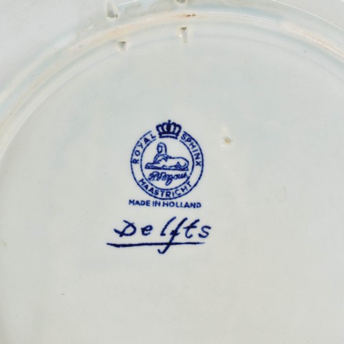 353 - A Delightful Delfts Blauw Wall Plate Featuring A Dutch Windmill Scene. 26cm Diameter.