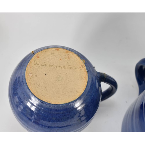 374 - A Collection Of 4 Studio Pottery Items Including A 3 Handle Pot By C.H. Brannan