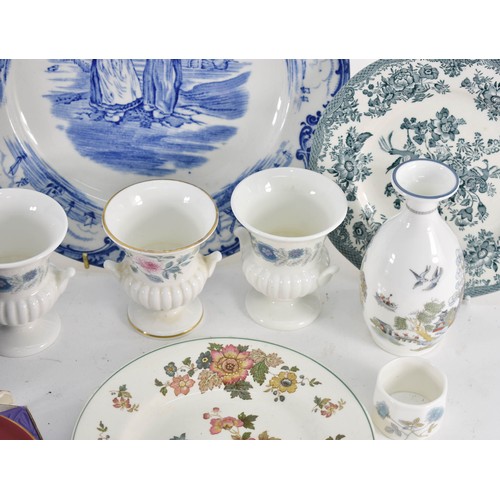 385 - An Assortment Of Various Wedgwood Items Including 4 Plates, 3 Urns And More