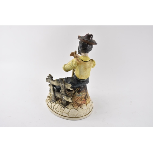 586 - Large Capodimonte Gardener figurine Seated on Bench Standing 30cm Tall